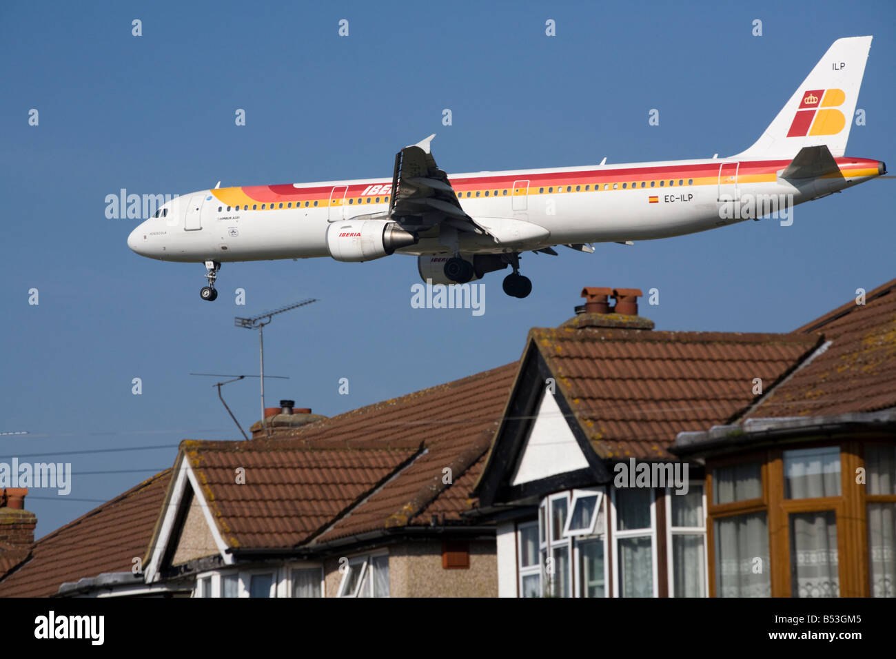 Iberia Airbus A321-211 plane landing at London airport. (41) Stock Photo