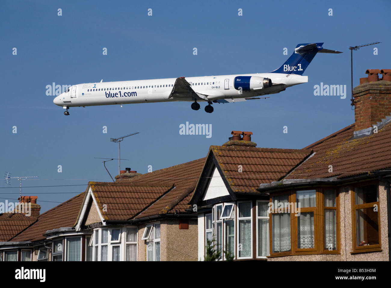 Blue 1 McDonnell Douglas MD MD-90-30 registration number OH-BLE approaching Heathrow airport, London. UK (41) Stock Photo