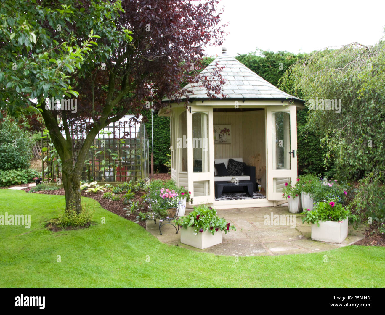 summer house in a small garden Stock Photo: 20362957 - Alamy