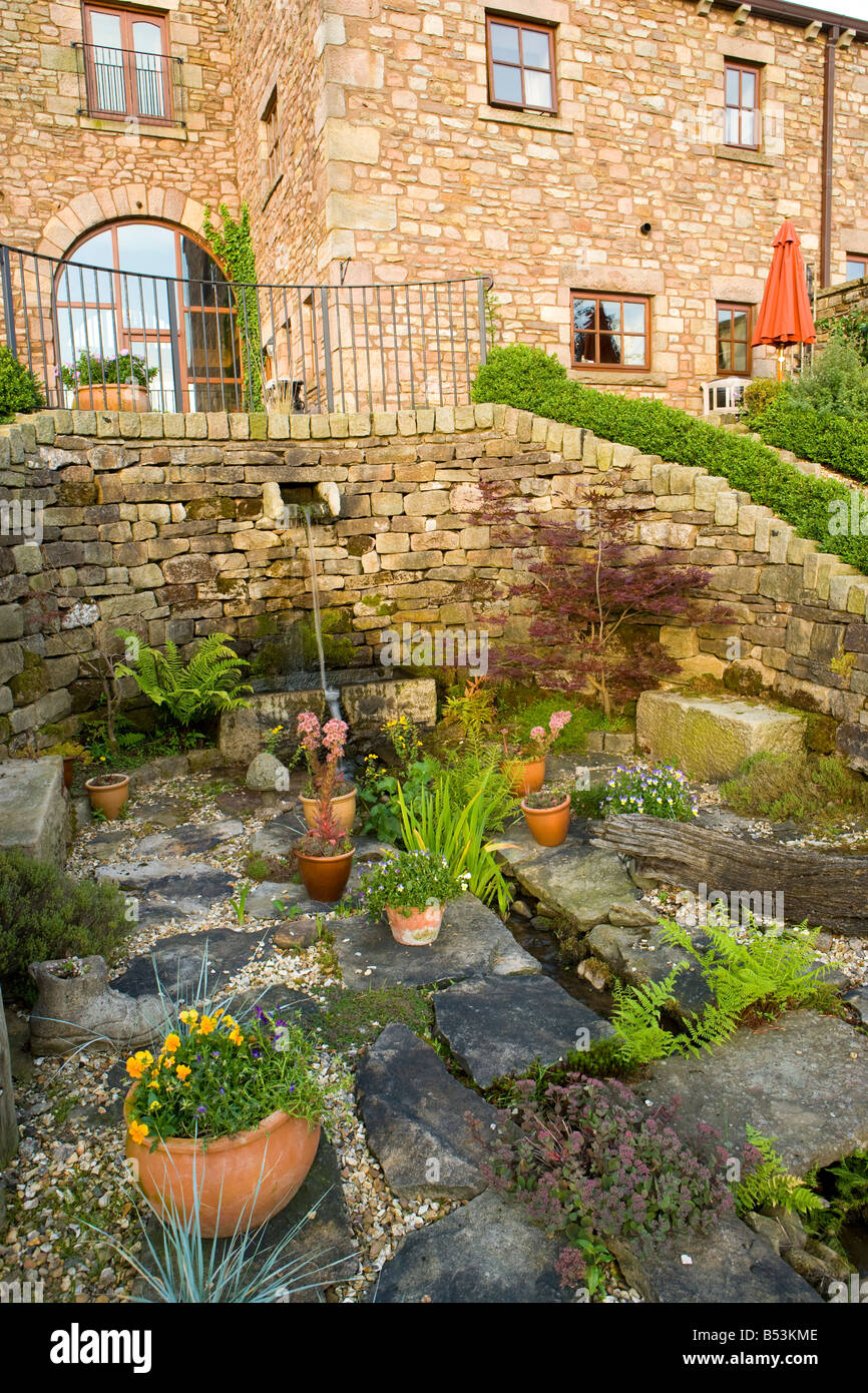 rockery in a large garden Stock Photo - Alamy