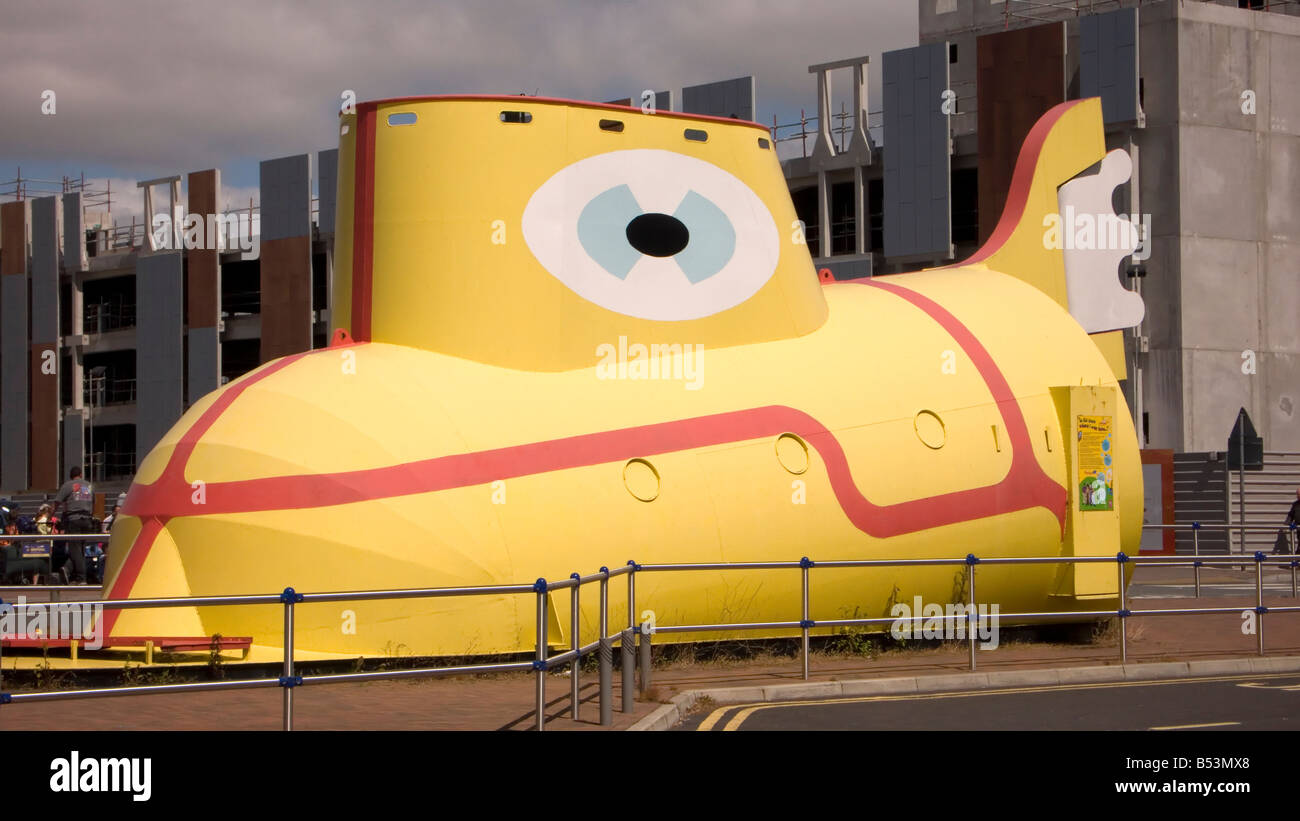 Yellow submarine parked outside John Lennon Airport in Liverpool UK Stock Photo