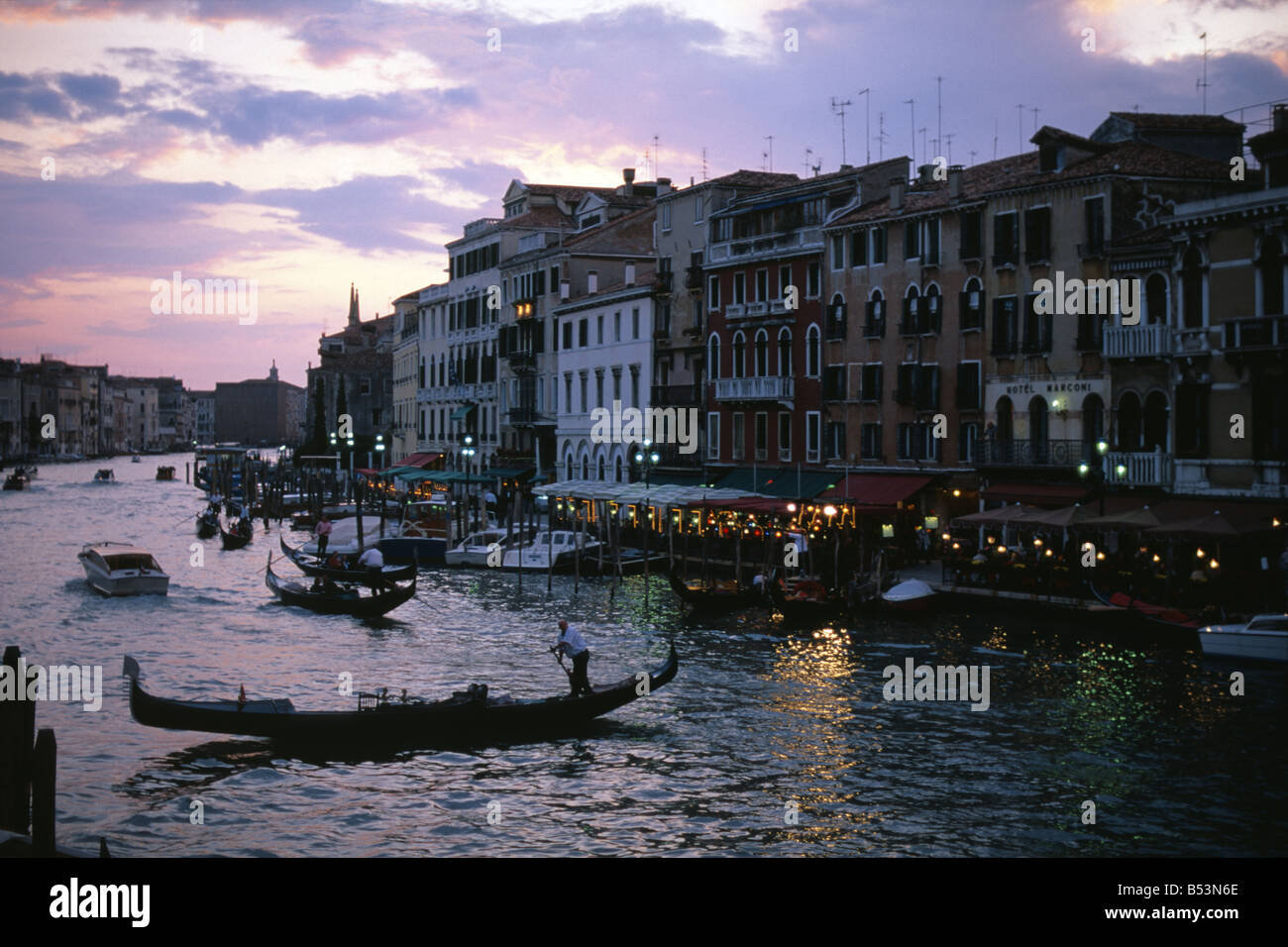 Gondola on the Grand Canal at sunset in Venice Italy Stock Photo - Alamy