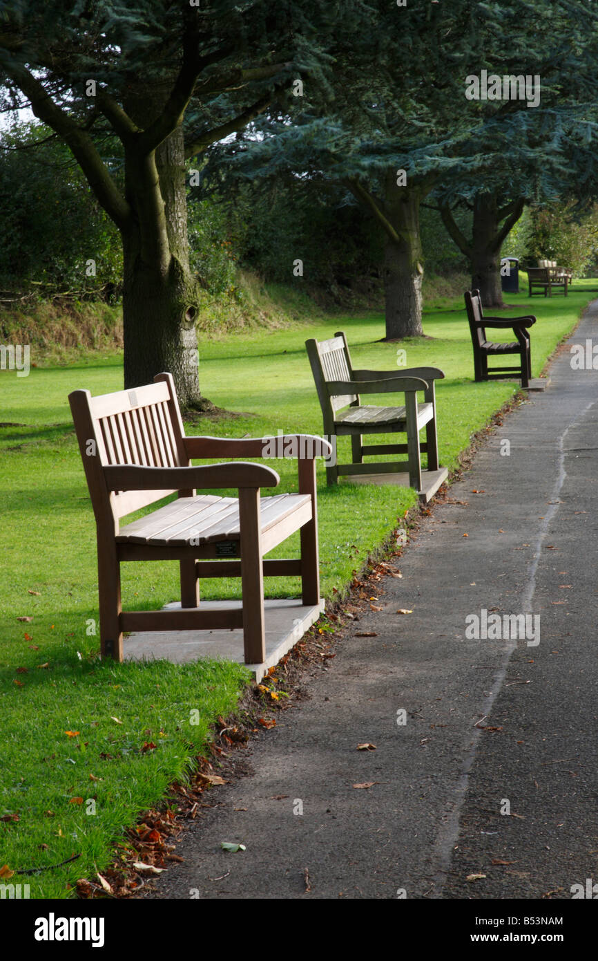 3 park benches Carlisle Cemetery Stock Photo