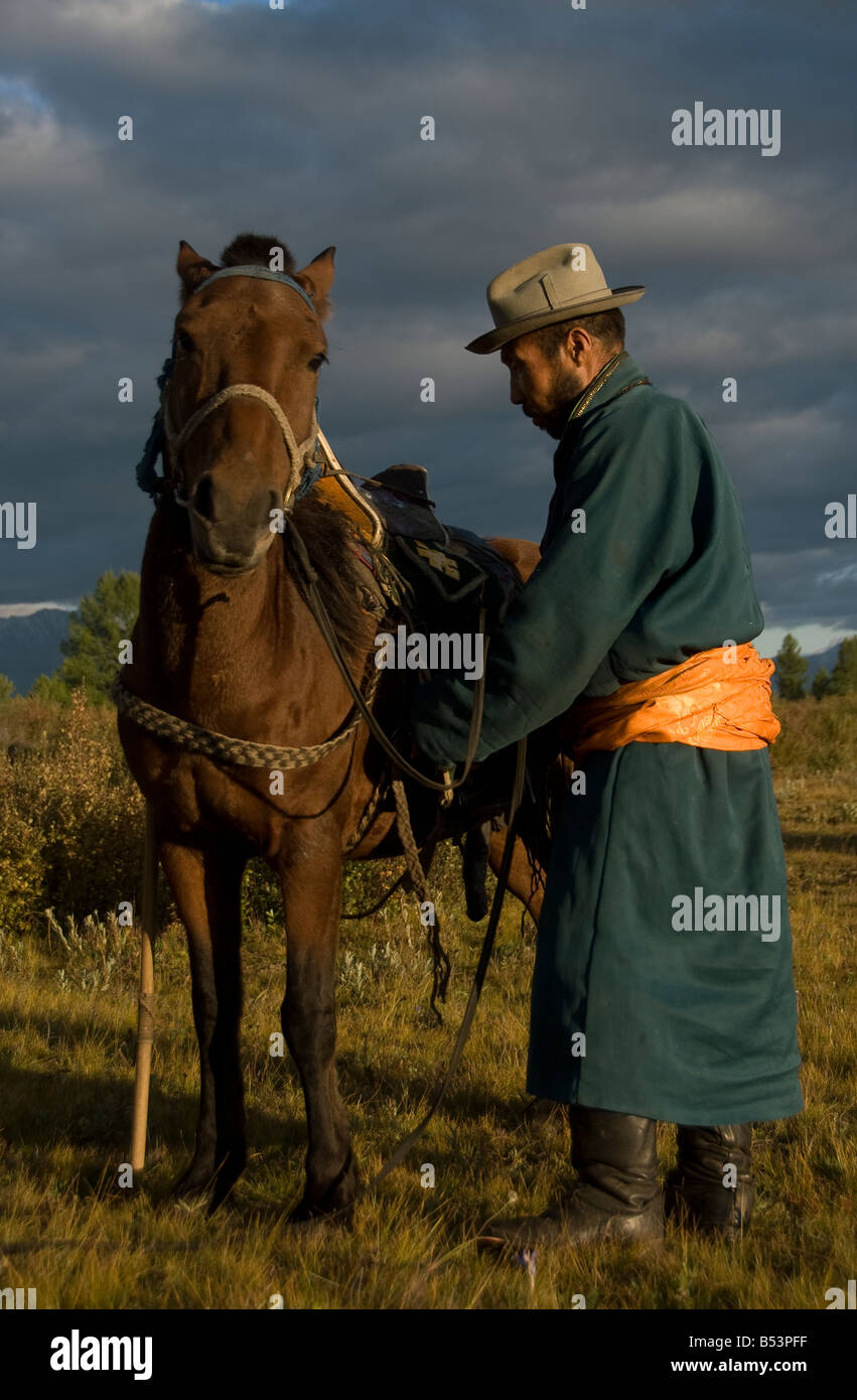Nomad with his horse Northern Mongolia Stock Photo - Alamy