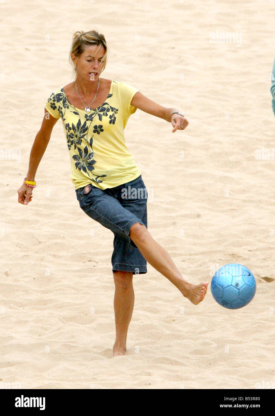 Kate McCann plays football on the beach in Pria da Luz, Portugal ...