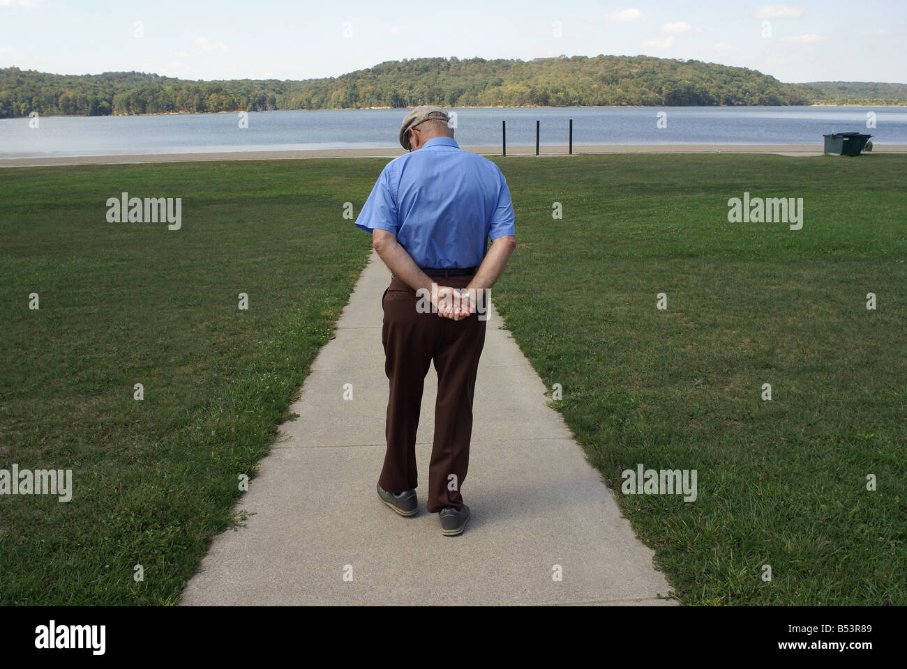 Sad lonely aged man walking hi-res stock photography and images - Alamy