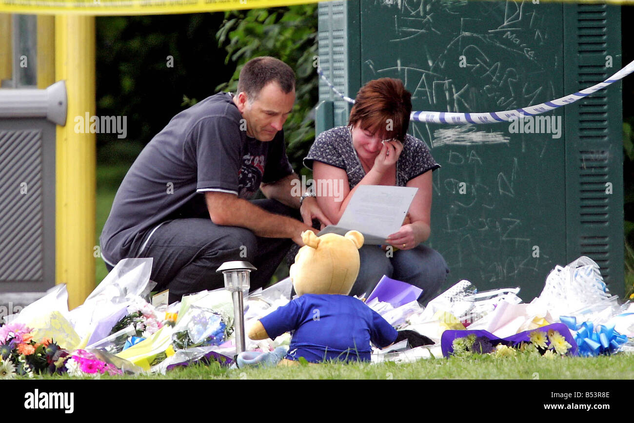 Stephen and Melanie Jones read floral tributes at The Fir Tree Pub in