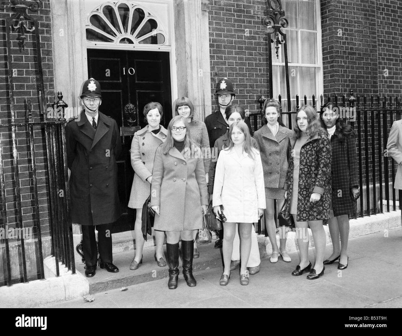 8 Schoolgirls handed in a petition with 2,000 names at No. 10 Downing Street, today. The girls all in form 5k at Plumstead Manor School, London, want the legal age for buying fireworks raised from 13 to 16. ;October 1969 ;Z10499 Stock Photo