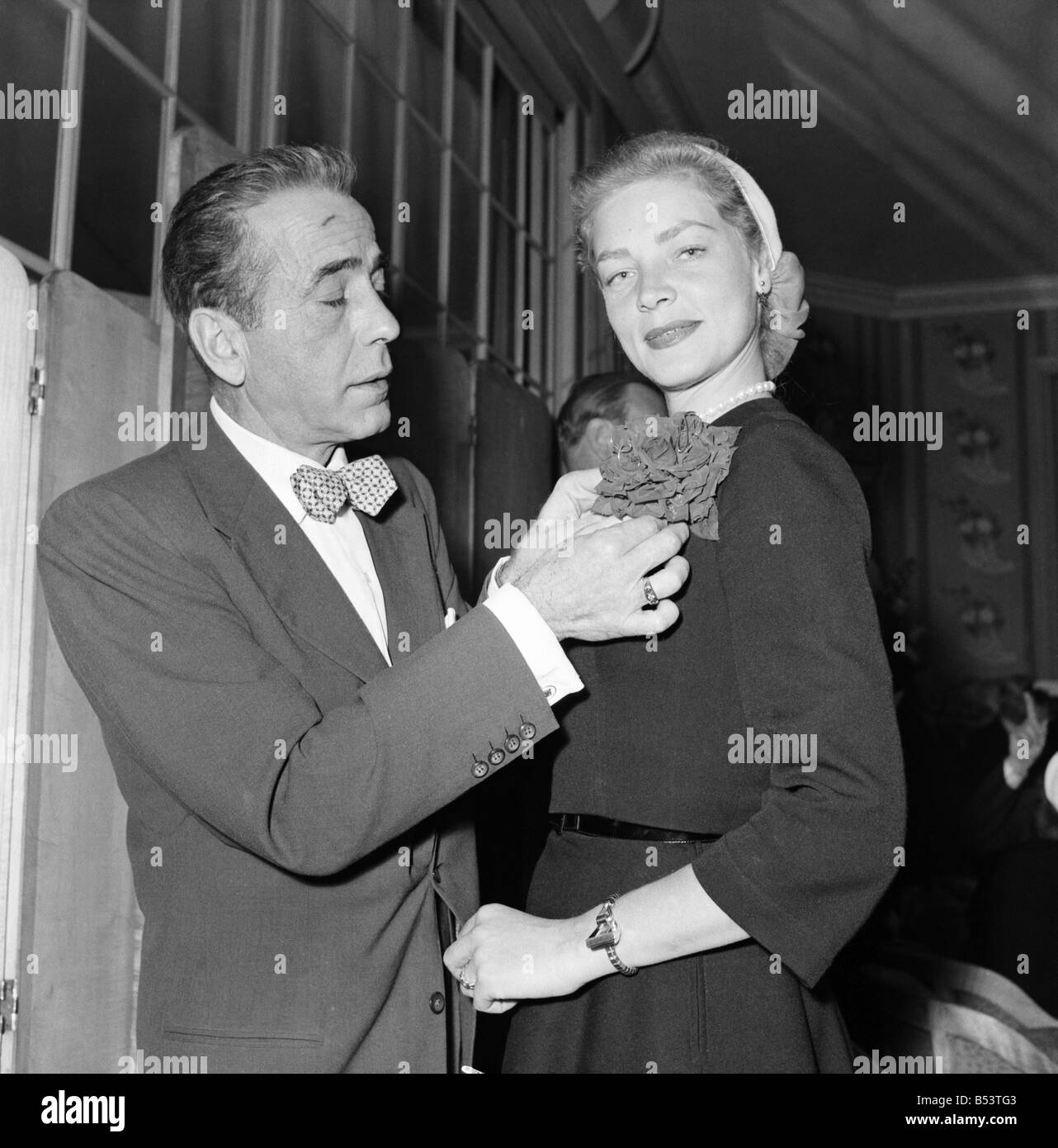Actor Humphrey Bogart and his wife Lauren Bacall at a press lunch held in their honour.. May 1953 D2581-001 Stock Photo