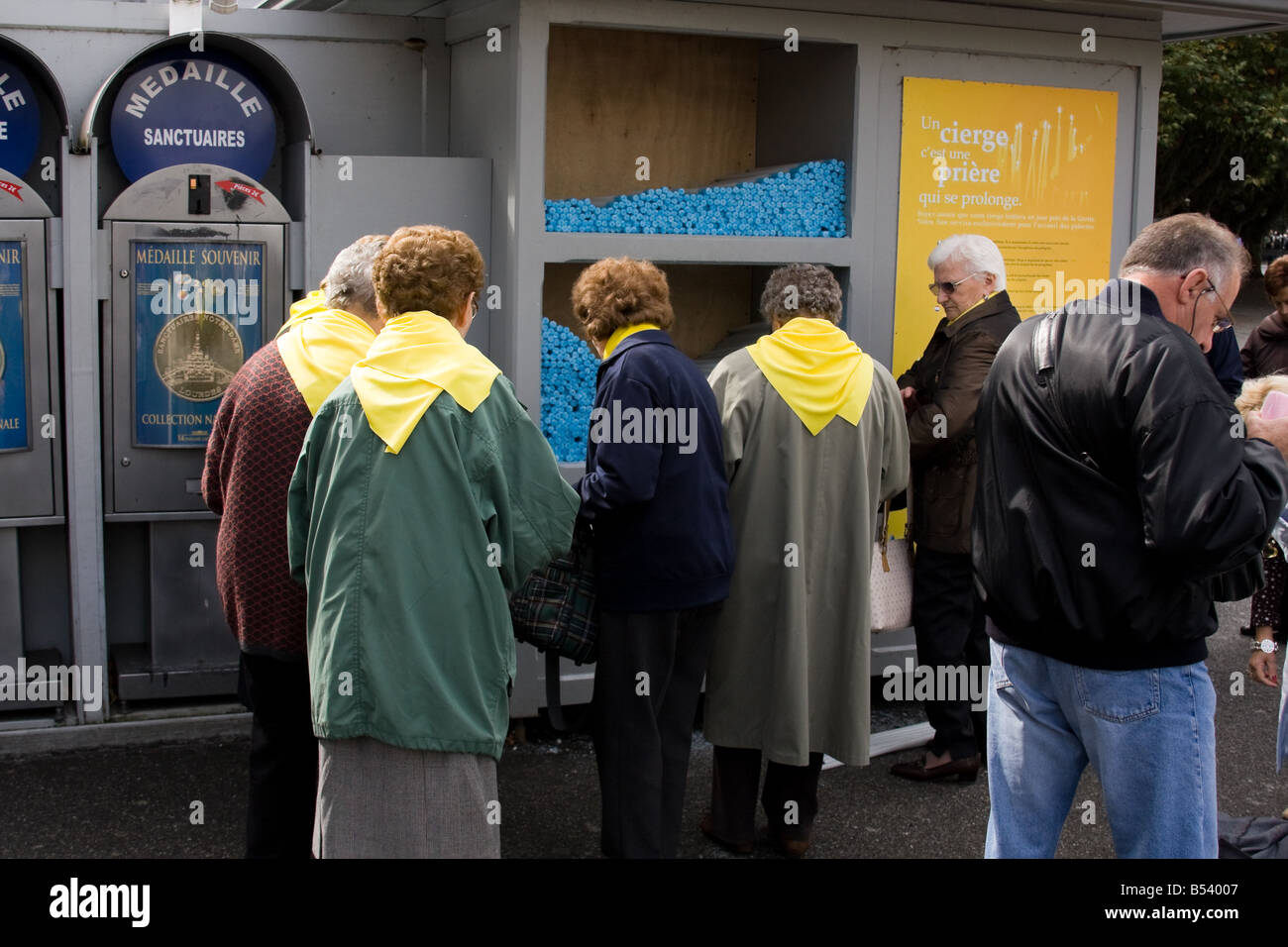 Buying holy candles Lourdes, Southern France Stock Photo Alamy