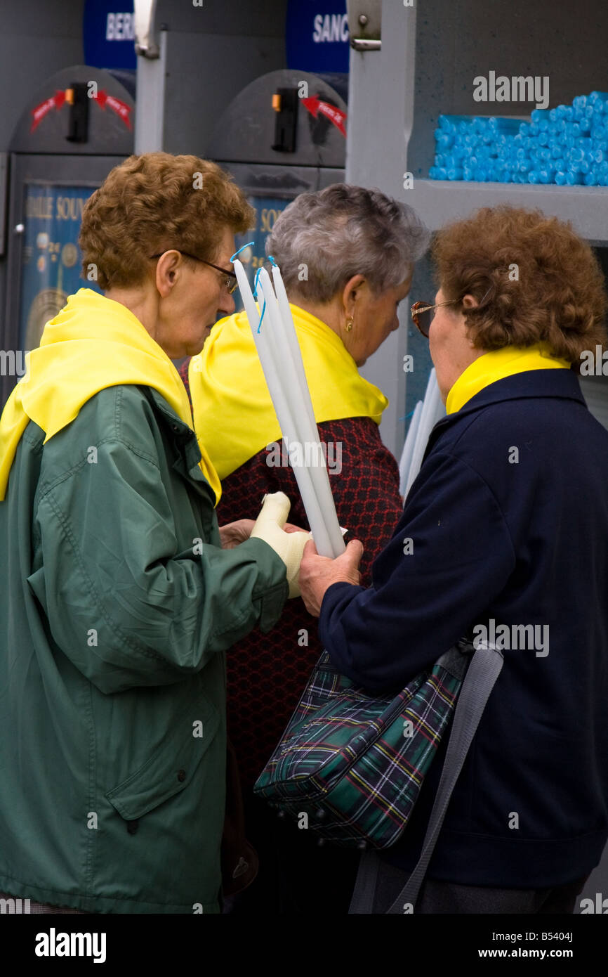 Buying holy candles Lourdes, Southern France Stock Photo Alamy