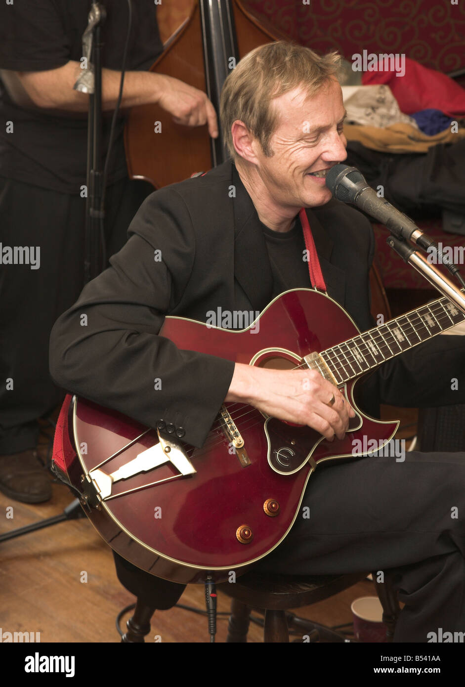 Man playing guitar at the Marsden Jazz Festival Marsden Huddersfield