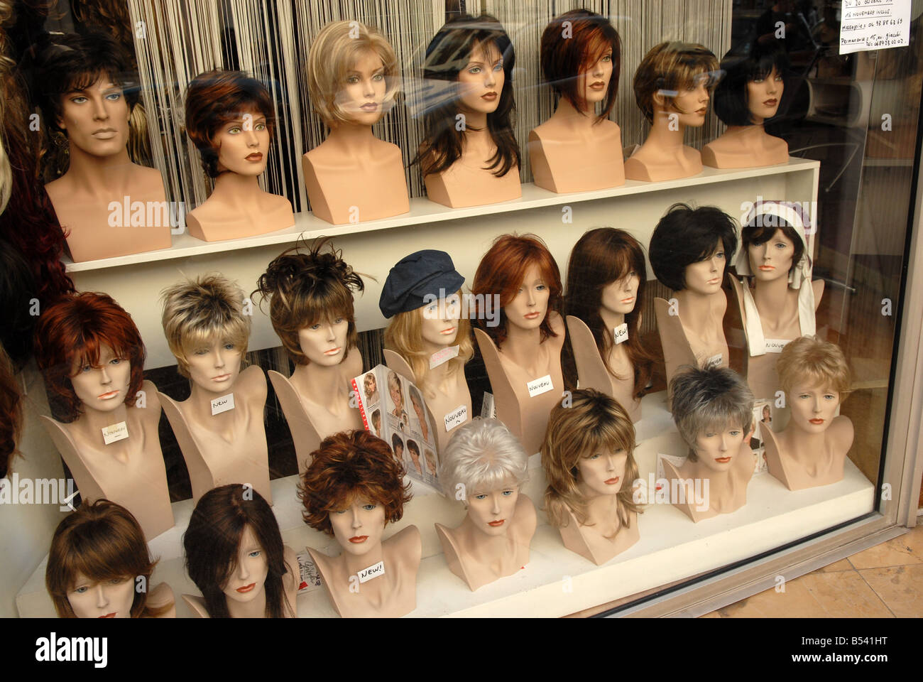 Shop display of wigs Stock Photo