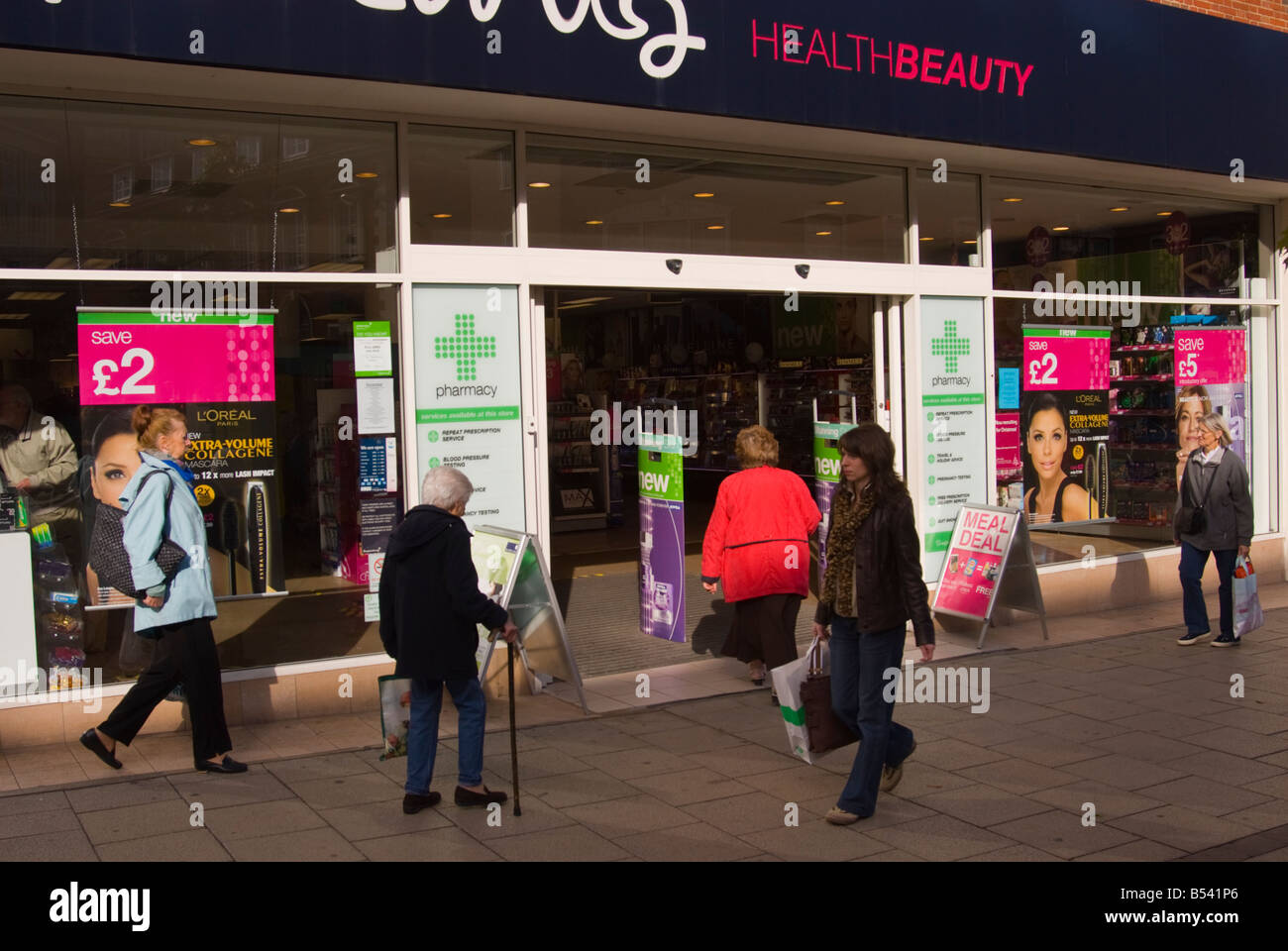 People outside Superdrug (pharmacy) in Norwich,Norfolk,Uk Stock Photo