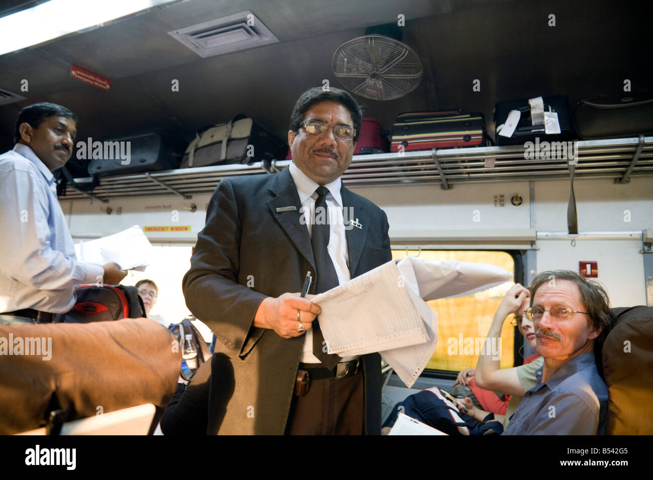 A ticket inspector on the Indian Railways, Sawai Madhopur to Delhi express, India Stock Photo