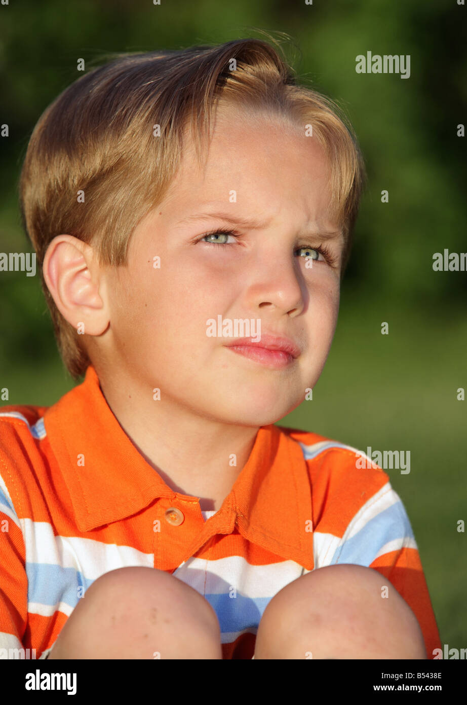 daydreaming little boy outdoors Stock Photo Alamy