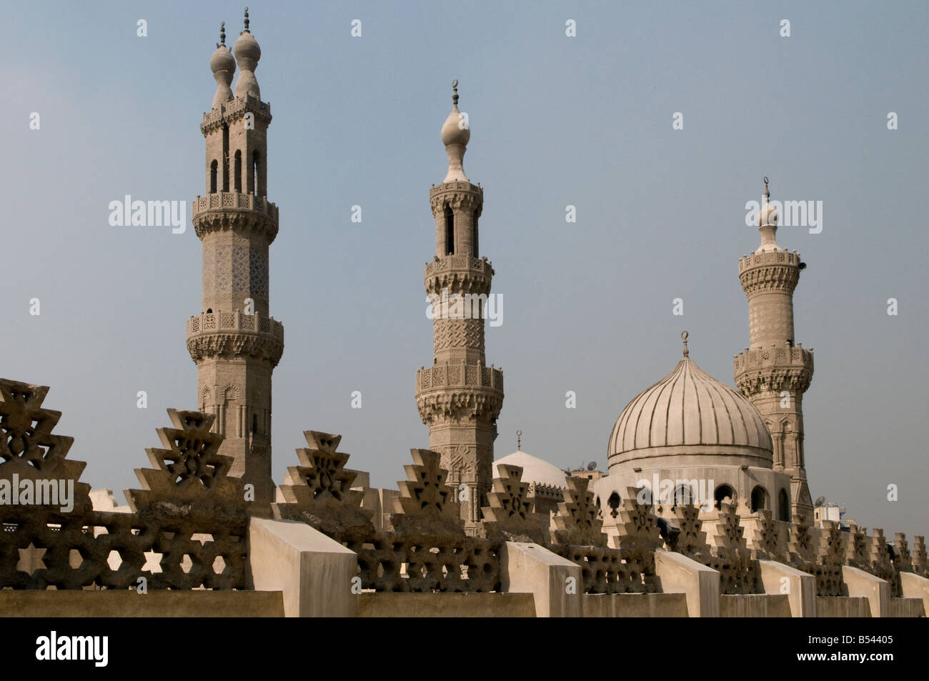 The Mamluk era double-finial minaret of Qansah al-Ghuri and minarets of Qaytbay and Aqbaghawiyya of Al-Azhar mosque in old  Islamic Cairo Egypt Stock Photo