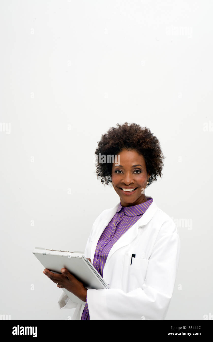 african american woman doctor nurse medical chart Stock Photo