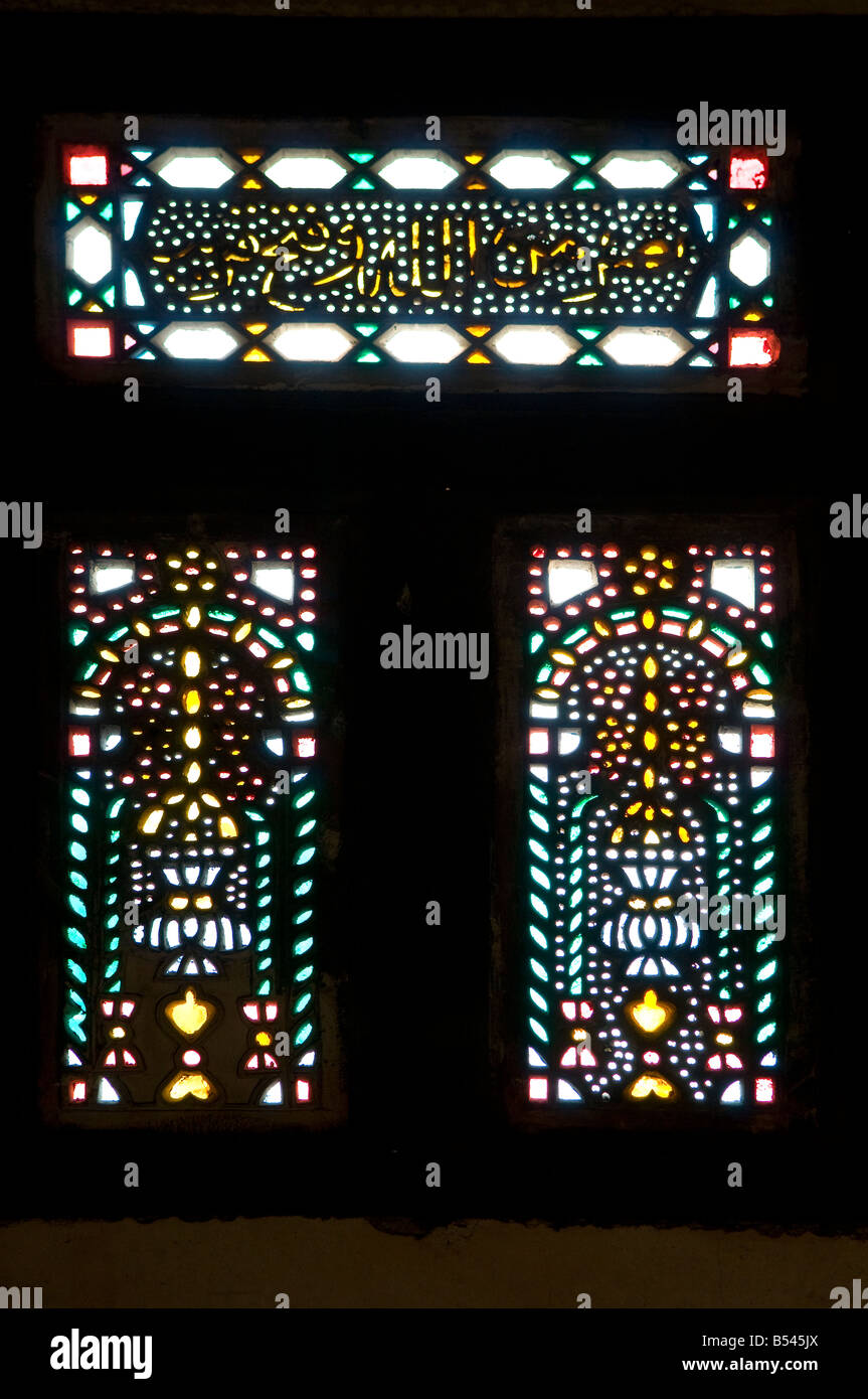 Egyptian style Mashrabiya window enclosed with carved wood latticework in Beit Zeinab al-Khatoun Ottoman-era house in Cairo Egypt Stock Photo