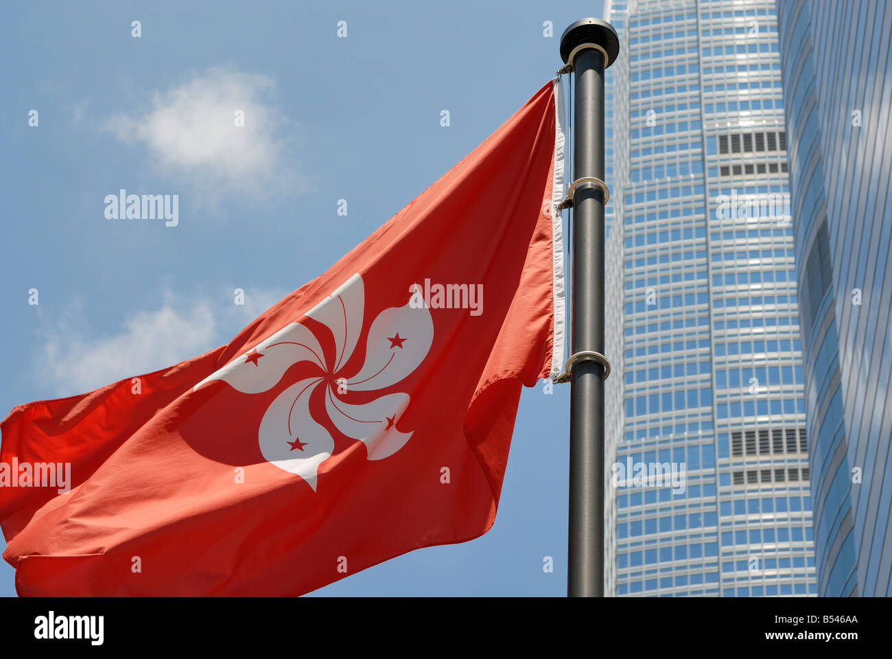Hong Kong flag with IFC in background Stock Photo