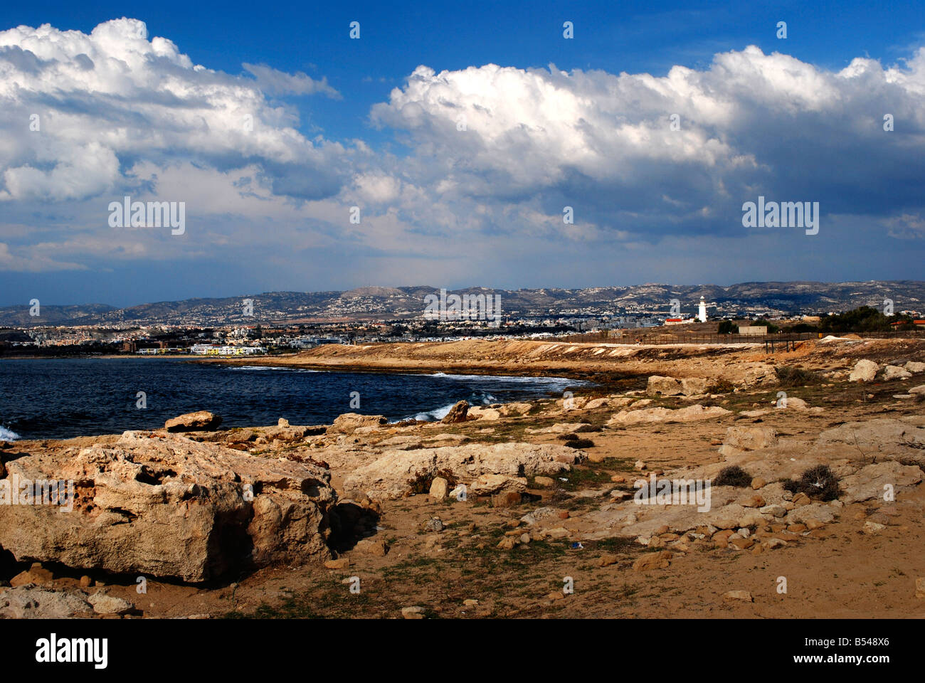 The beach and seashore seen from the lighthouse walk with the lighthouse in the distance at