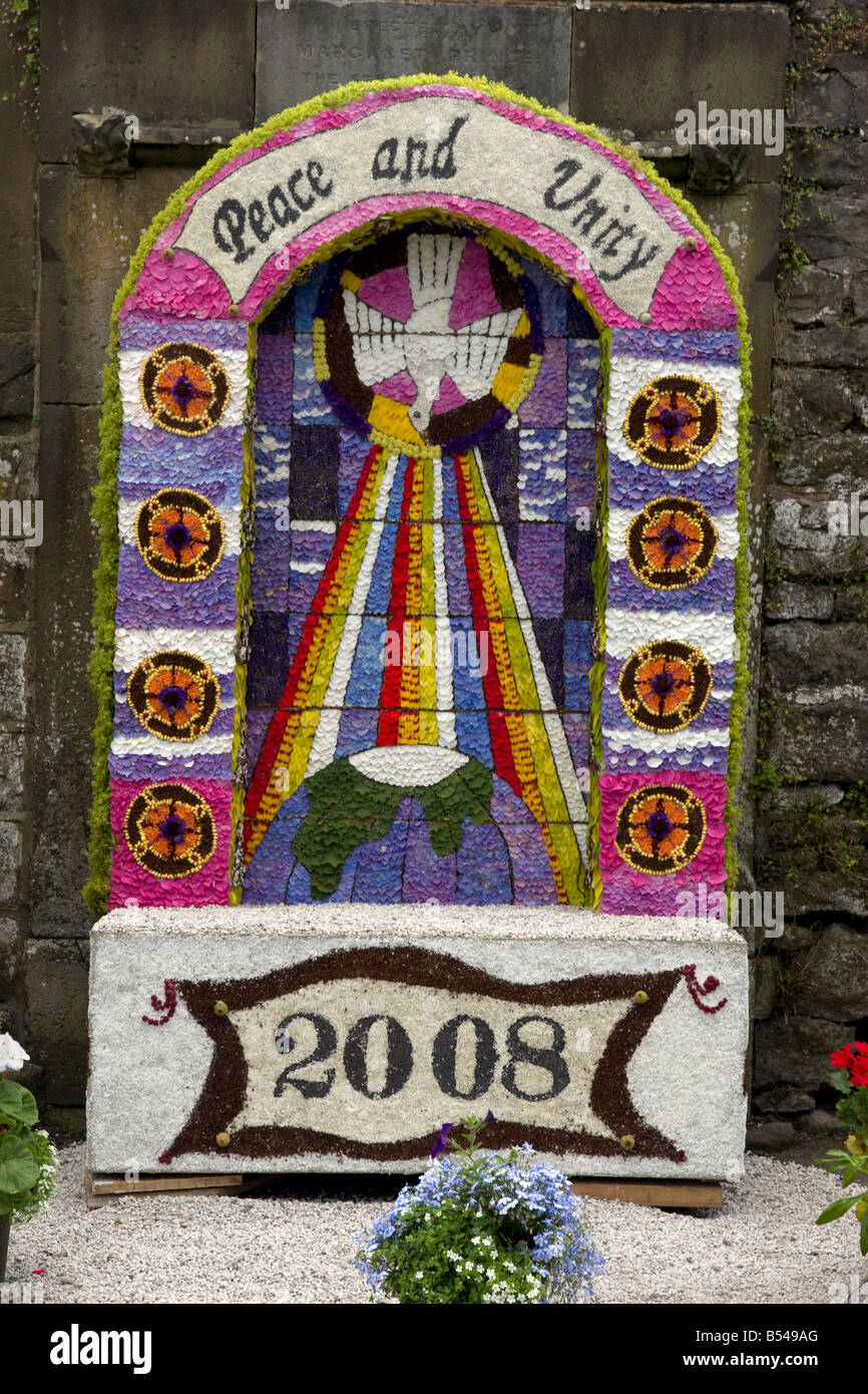 peace and unity traditional derbyshire well dressing at bonsall village Stock Photo