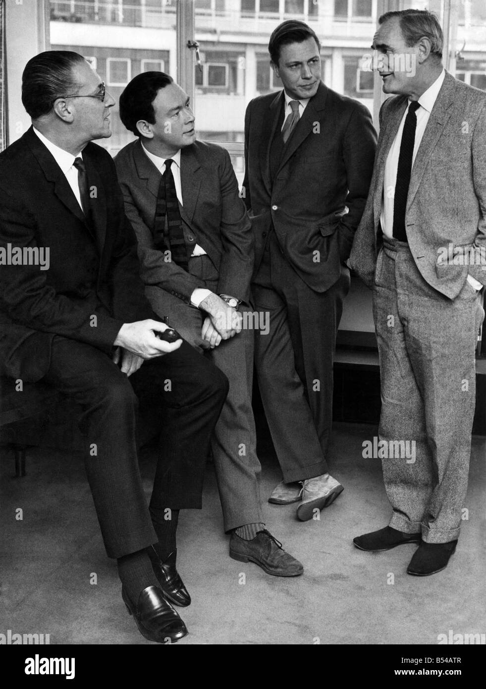 The three new BBC Television controllers came together for the first time this morning in their new jobs. They were at Television Centre at White City, Shepherds Bush. Photographed left to right: Kenneth Adam, director of BBC. TV, Michael Peacock, controller of BBC1, David Attenborough, controller of BBC2 and Huw Wheldon, controller of program for television. ;March 1965 ;P016994 Stock Photo