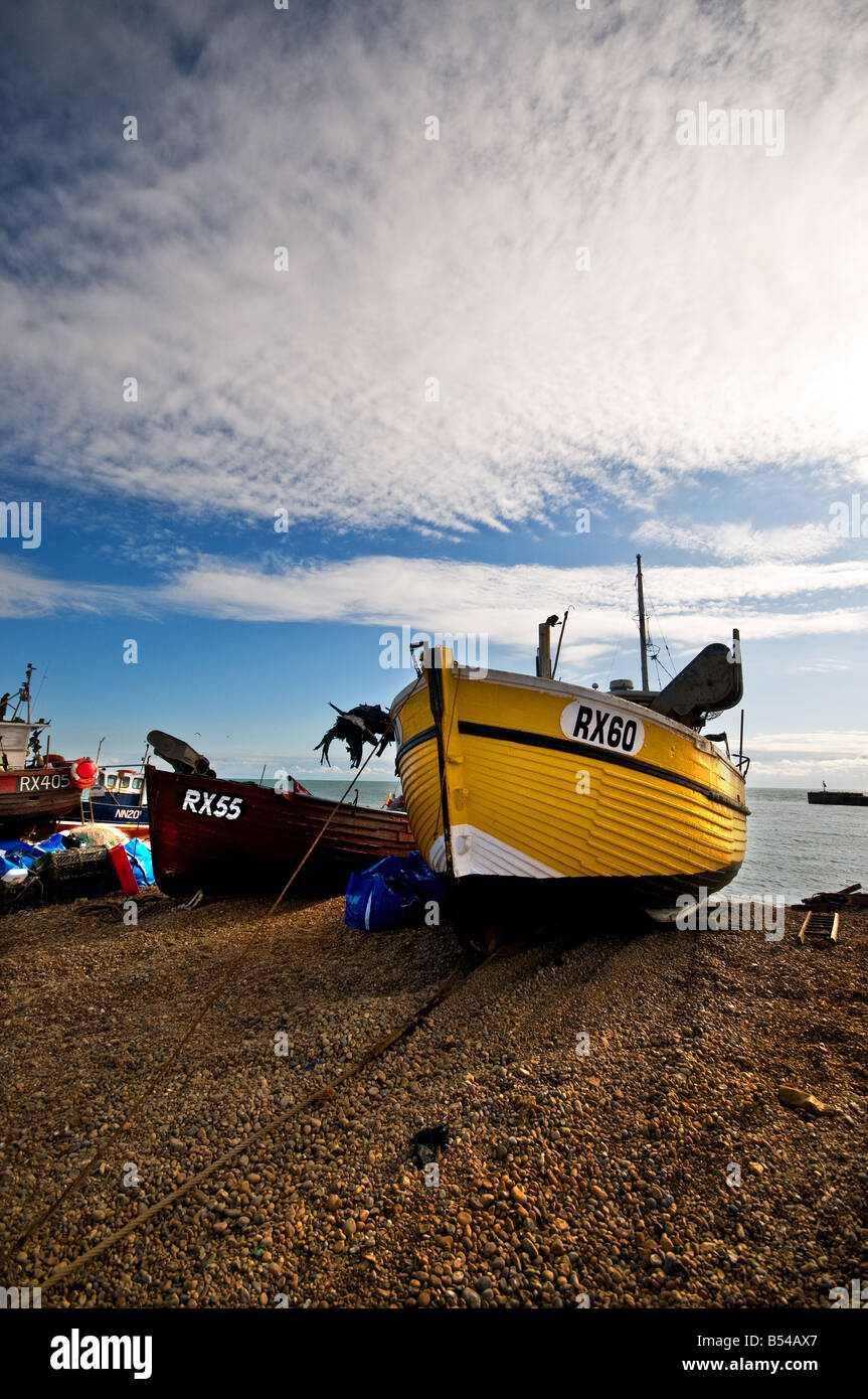Fishing boats beached on the Stade at Hastings in Sussex. Stock Photo