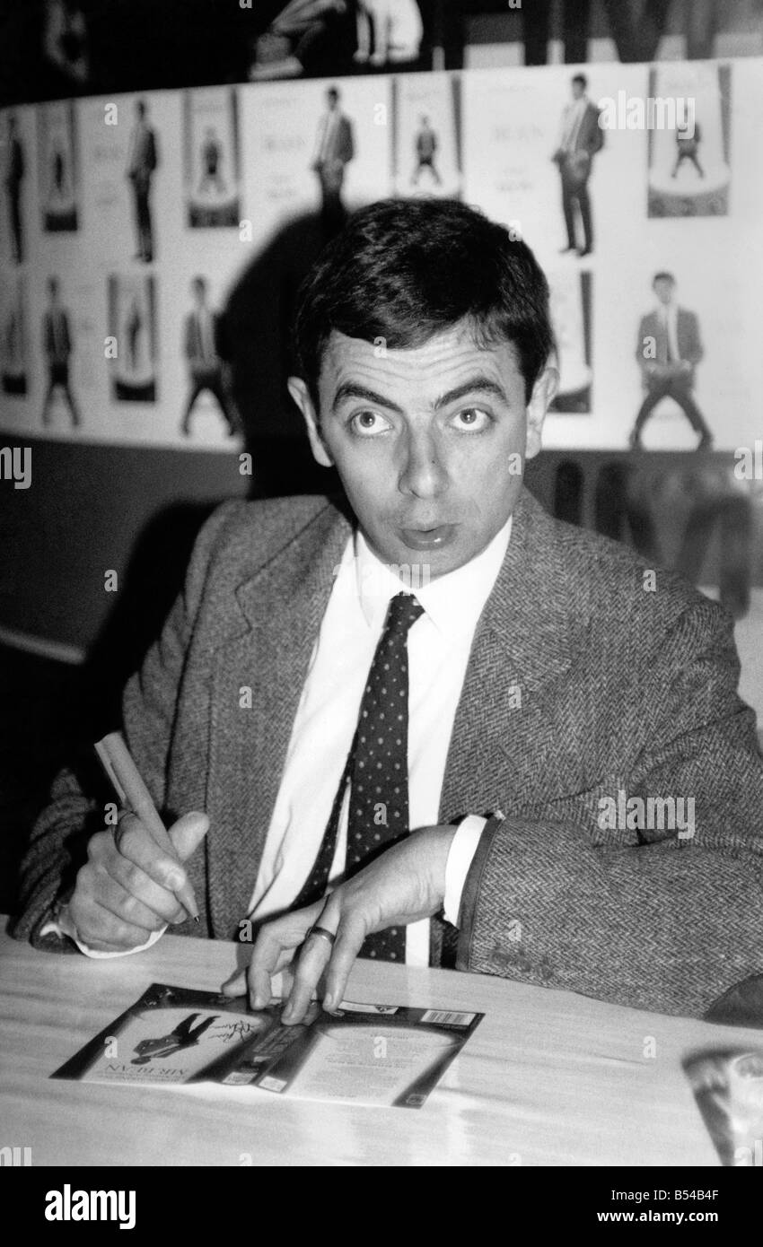 Rowan Atkinson sign copies of a Mr Bean video at HMV music store in ...