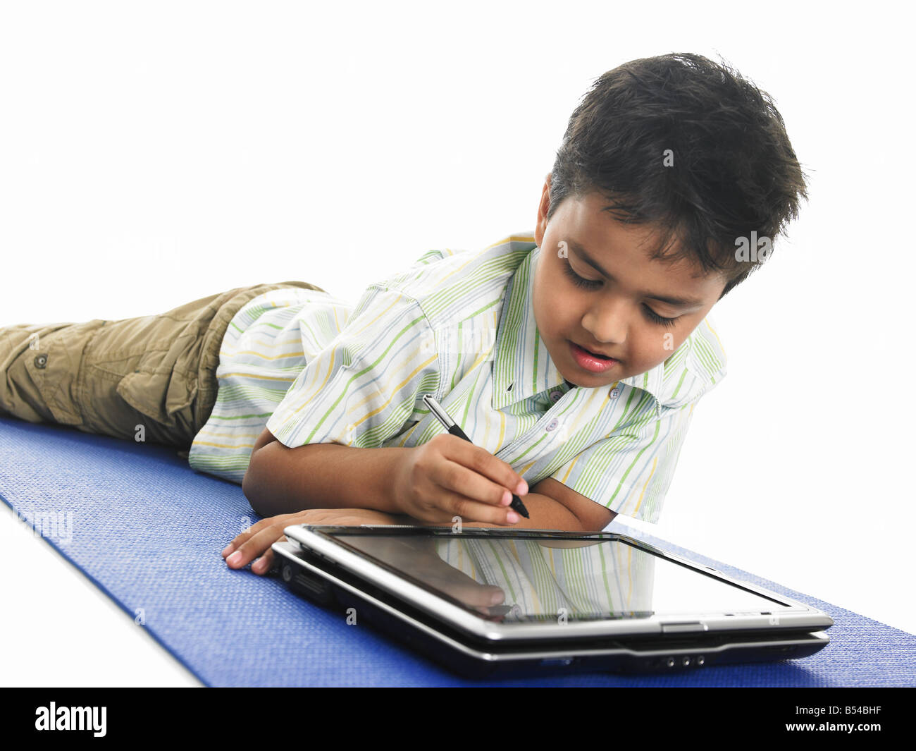 India child boy technology hi-res stock photography and images - Alamy