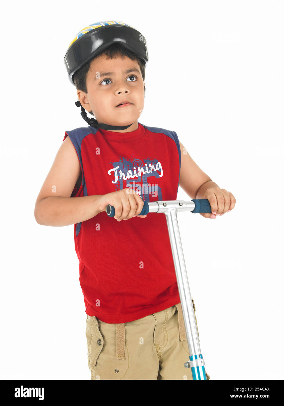 Asian boy smiling blue t shirt hi-res stock photography and images - Alamy