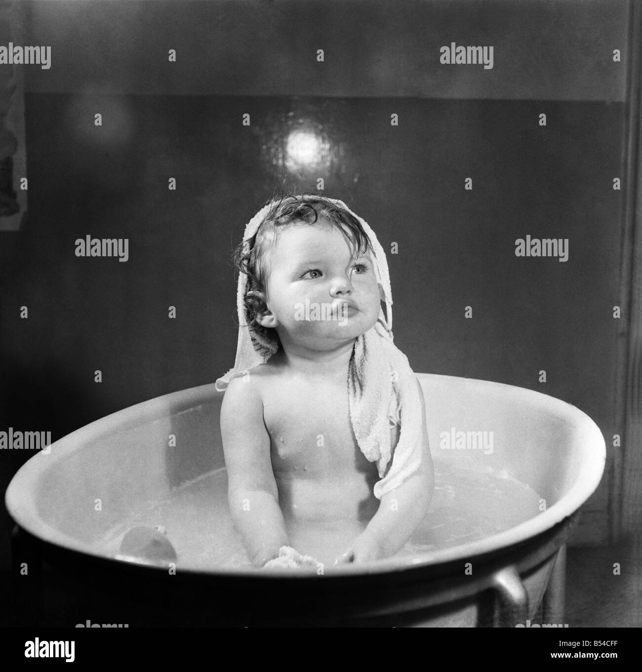 Bath time for one year old Kathleen Skelly is the happiest moments for