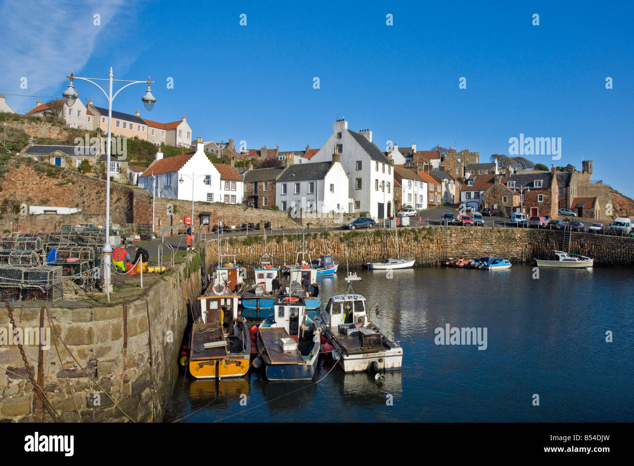 Crail harbour Fife Scotland on a sunny autumn day with moored fishing boats Stock Photo