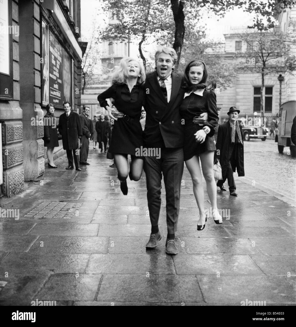 Entertainment. Theatre: Flying High that exactly what Hayley Mills will be doing shortly - across the stage the New Victoria Theatre, where she opens on the 19th of December as the 39th 'Peter Pan', Today at the Garrick Theatre Hayley met her co stars Louise Rush (20) who plays 'Wendy' and Bill Travers who plays her villainous enemy 'Captain Hook'. Bill Travers helps Hayley Mills (left) and Louise Rush to travel with their feet off the ground. November 1969 Z10629-001 Stock Photo