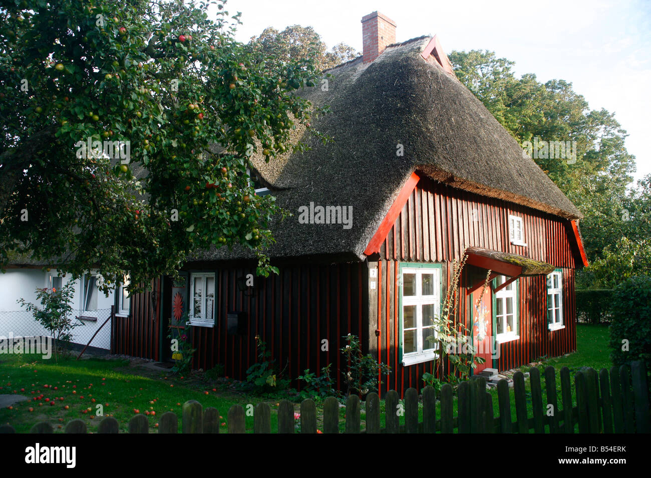 Old house with a thatched roof at the village Born Mecklenburg Western Pomerian Germany Stock Photo