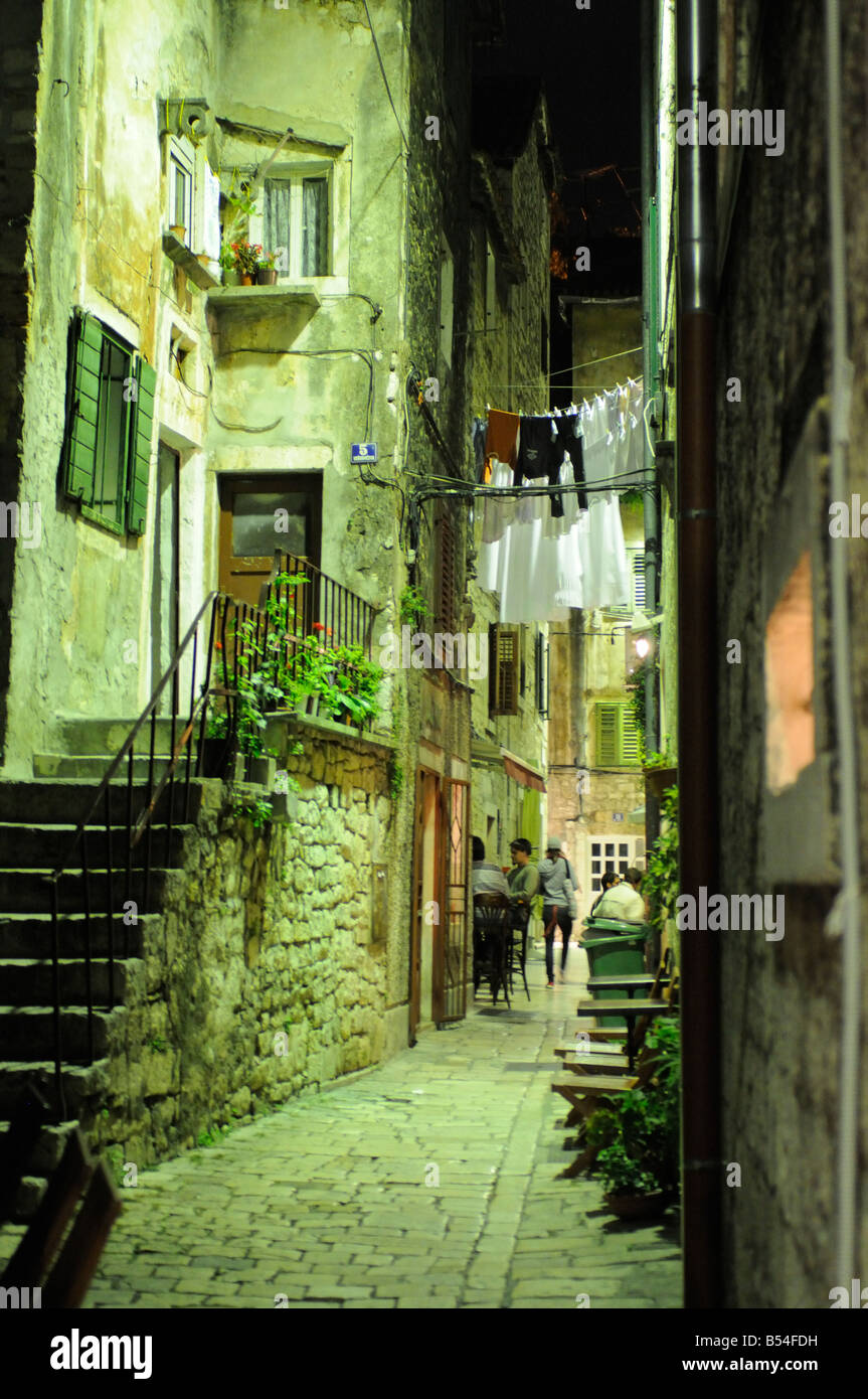 Stone cobbled lane with washing on the line at night Split Dalmatia Croatia Stock Photo