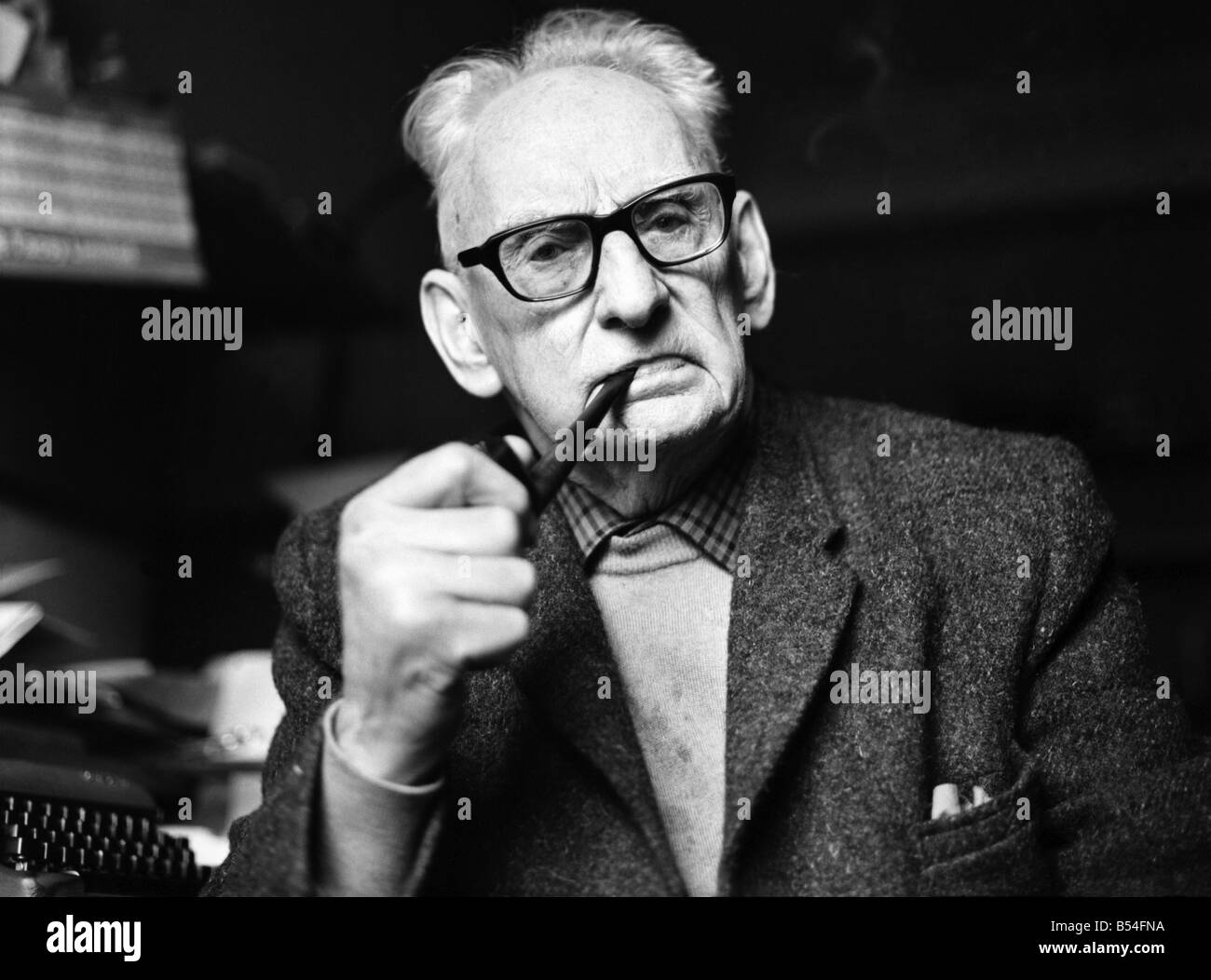 Elderly man smoking a pipe. December 1969 Z11584 Stock Photo