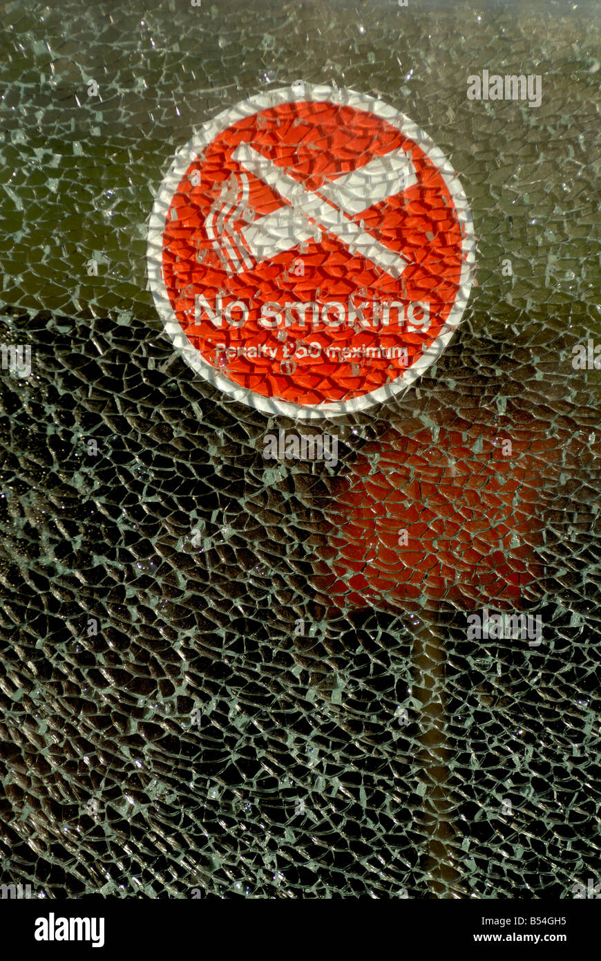 no smoking sign on broken window Stock Photo Alamy