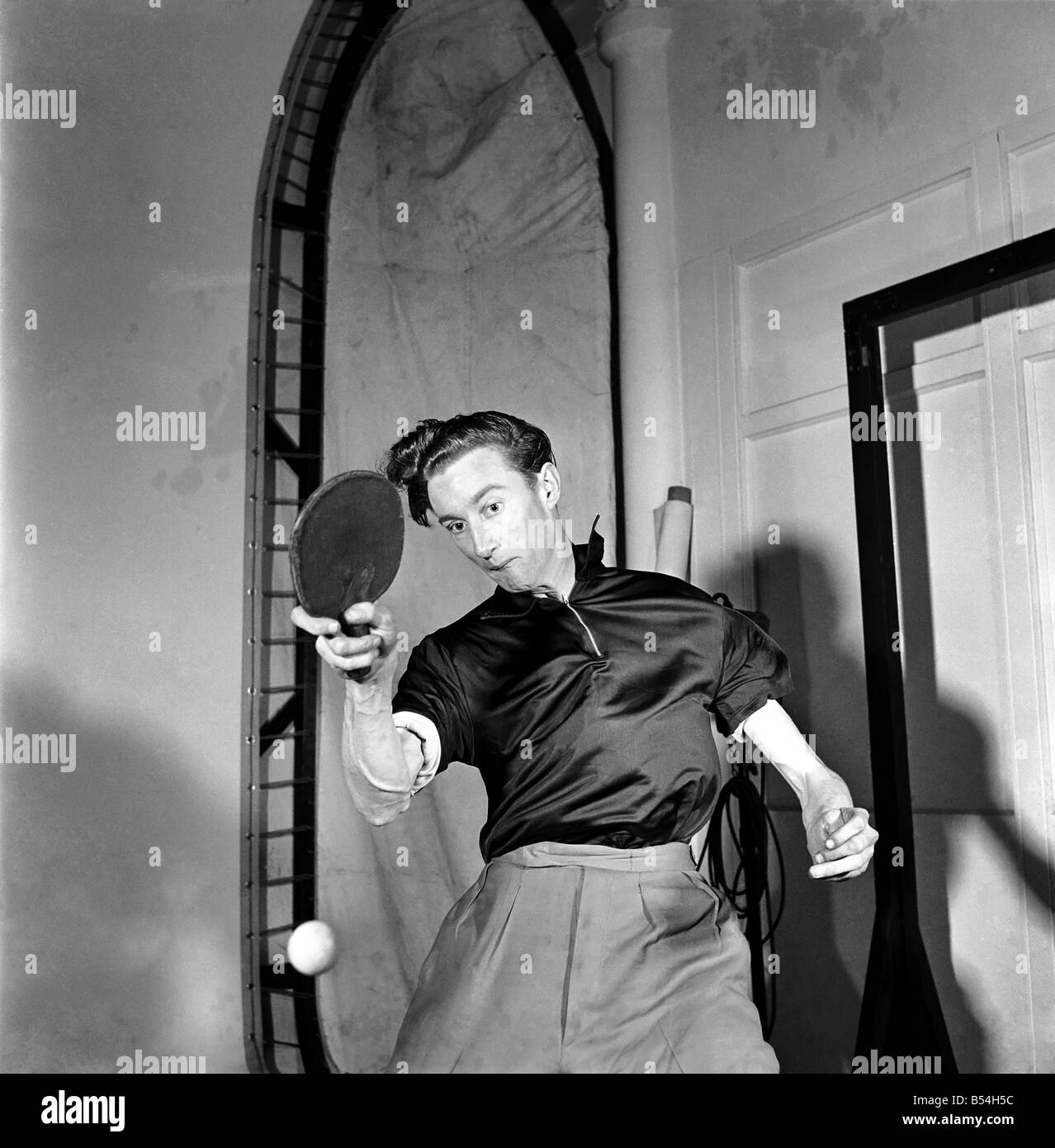 Man playing table tennis Black and White Stock Photos & Images - Alamy