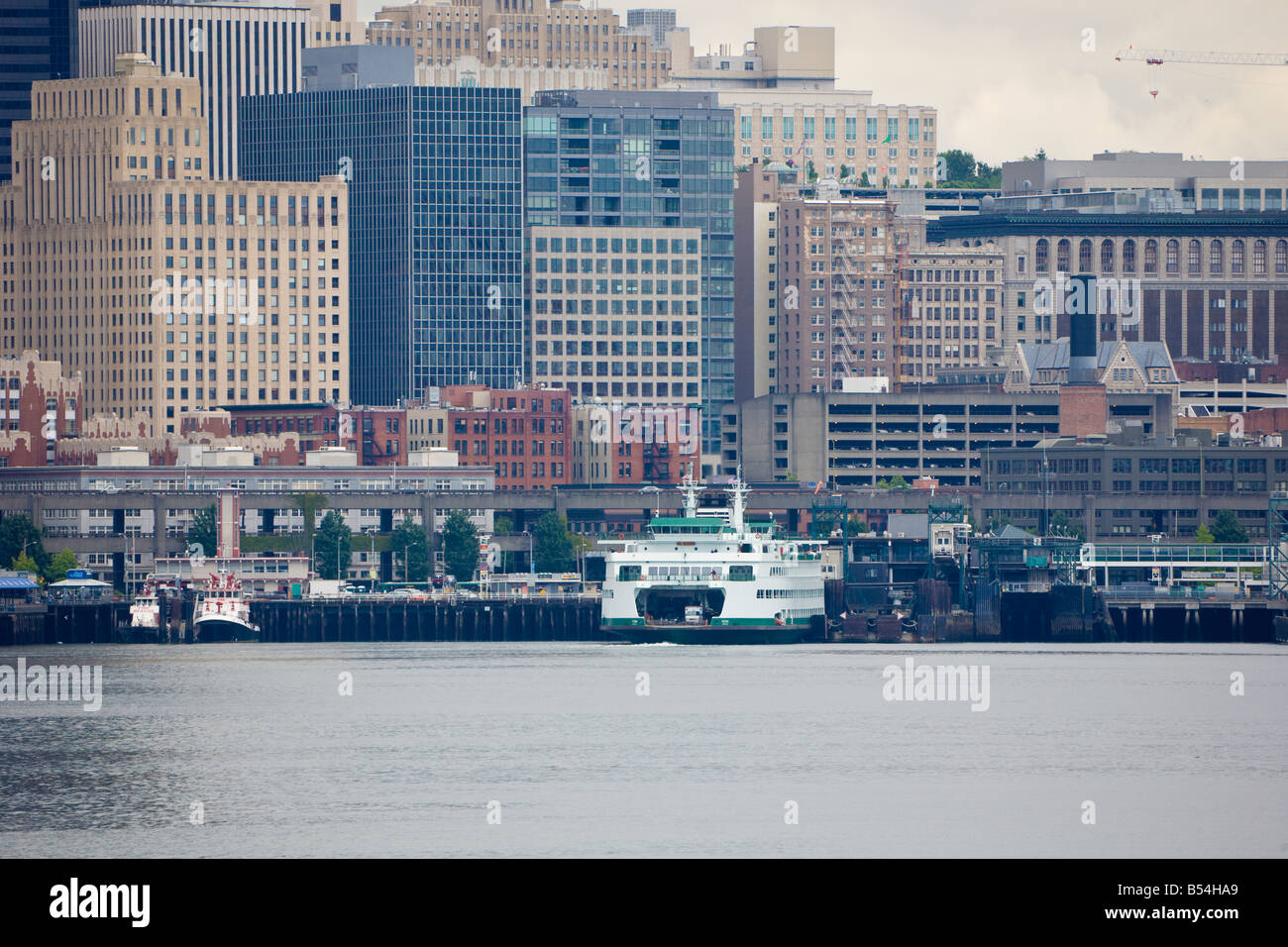 Ferry boat at dock in downtown Seattle Washington Stock Photo