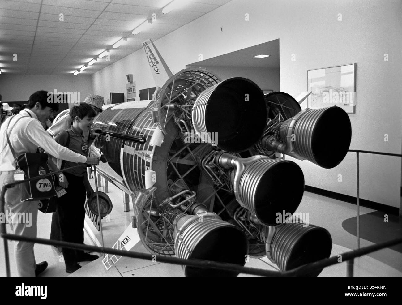 Visitors at NASA Space Station in Florida, U.S.A a few hours before Apollo 12 blasted off on a mission to the moon. Looking at Stock Photo