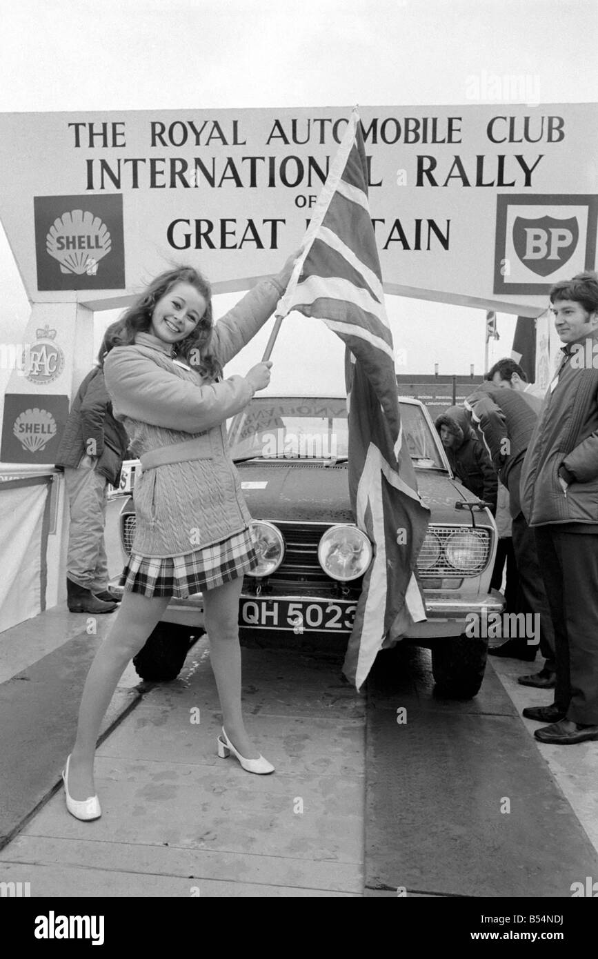 R.A.C. Rally: Miss U.K. Sheena Drummond, Waves the flag for the start of the R.A.C. Rally. November 1969 Z11051-001 Stock Photo