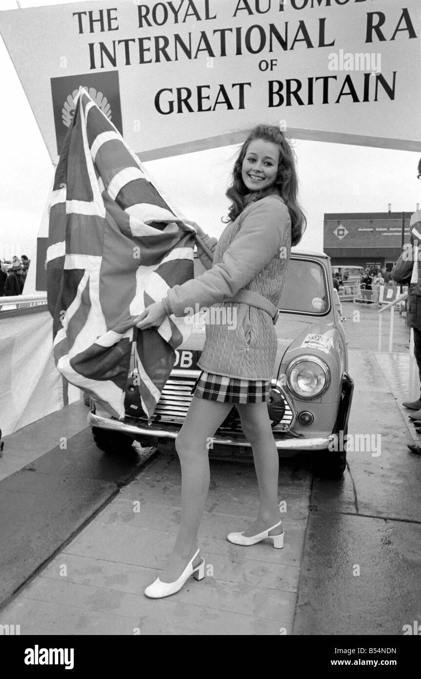 R.A.C. Rally: Miss U.K. Sheena Drummond, Waves the flag for the start of the R.A.C. Rally. November 1969 Z11051-003 Stock Photo