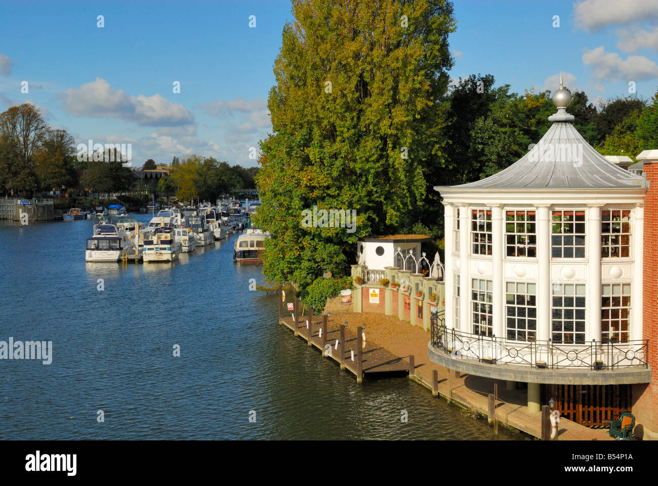 View from Hampton Court Bridge over the River Thames, including the restaurant at the Mitre Hotel Stock Photo