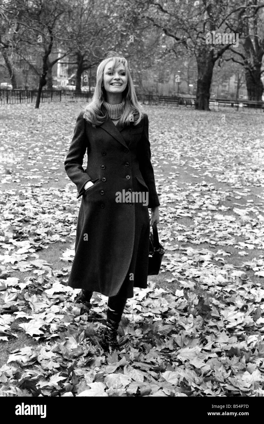 Fashion Clothing. Woman Model: Blanche Webb wearing the 'midi' coat ...