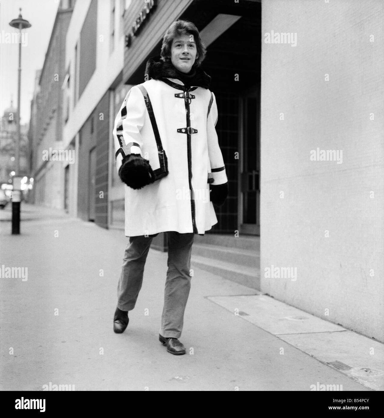 White fur lined coat Black and White Stock Photos & Images - Alamy