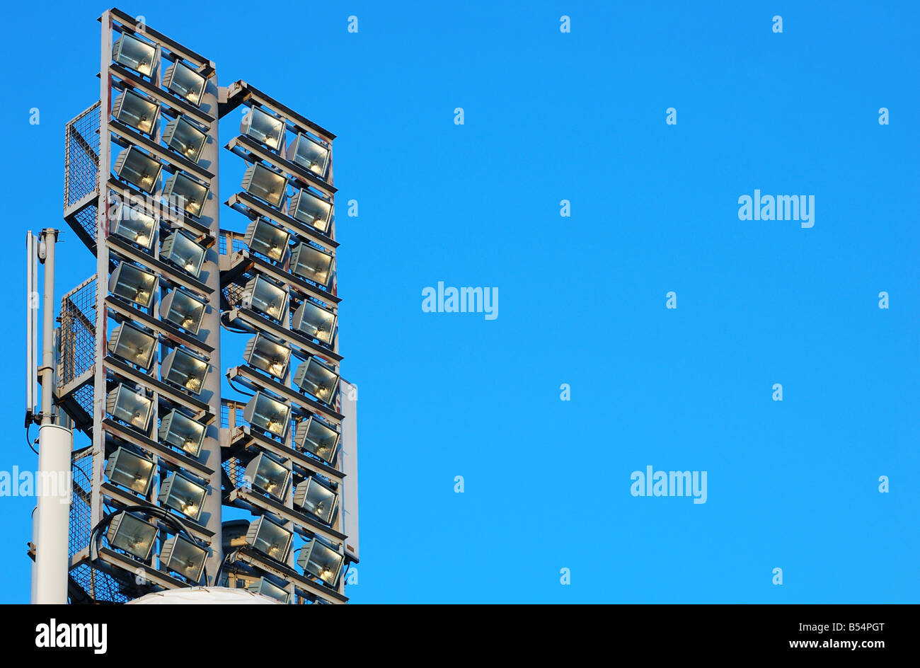 stadium floodlight over clear blue sky Stock Photo