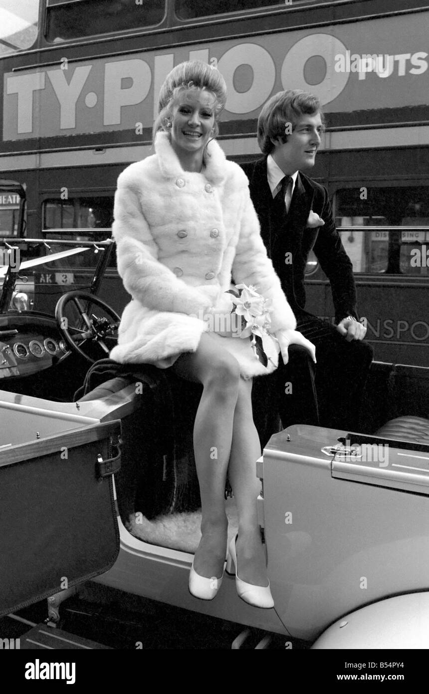 Actess and top model Vicki Hodge today married Ian Heath ,who is in advertising, at Chelsea Register Office. The bride wore a white mini dress and coat, and the couple drove off after the ceremony to a small lunch reception in a white 1923 Rolls Royce. The couple Vicki and Ian pictured after the ceremony. December 1969 Z11599-008 Stock Photo