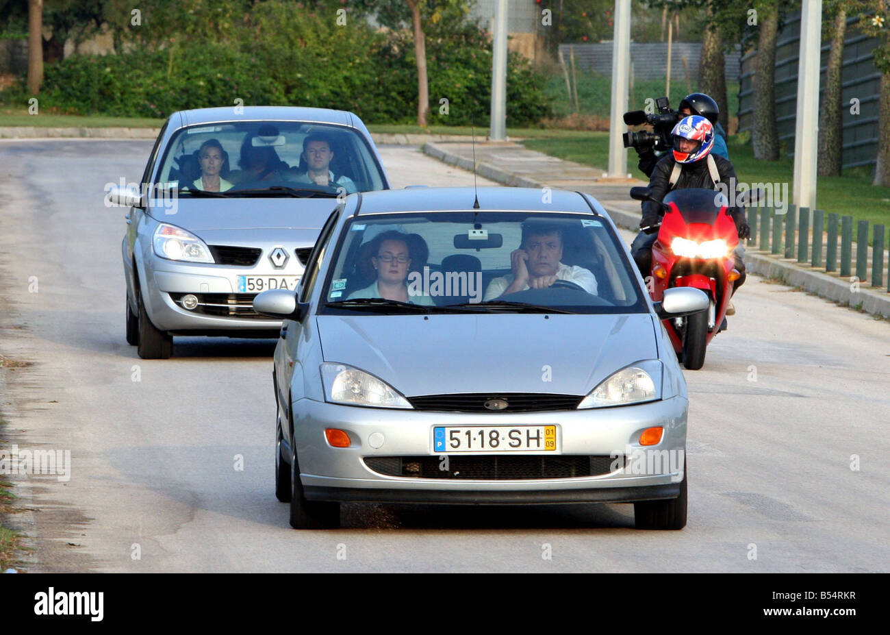 Kate and Gerry McCann arrive at Faro airport on their way back home to