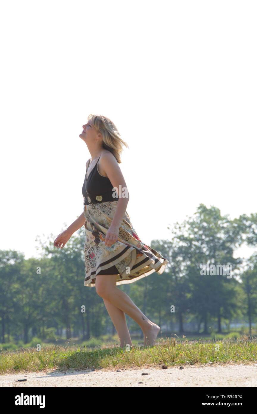 Barefoot dancing grass hi-res stock photography and images - Alamy